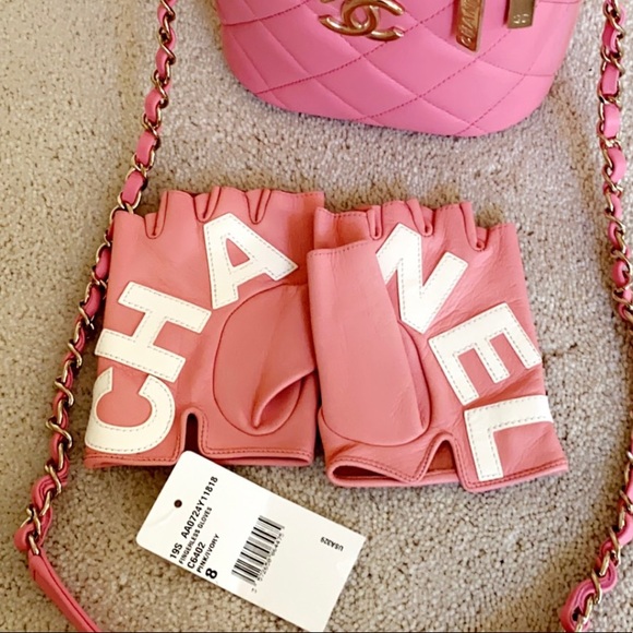 Pink leather Chanel logo fingerless gloves BNWT